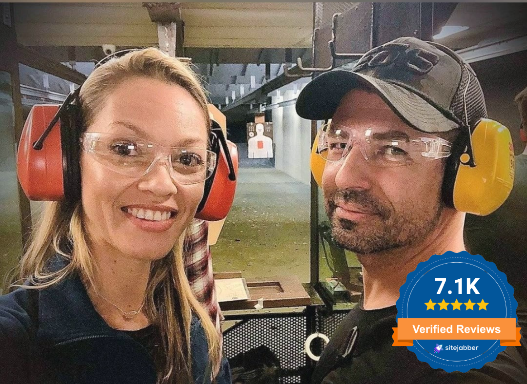Male and female on gun range
